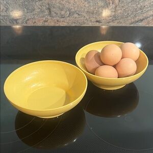 (2) vintage Tupperware yellow cereal or fruit bowls